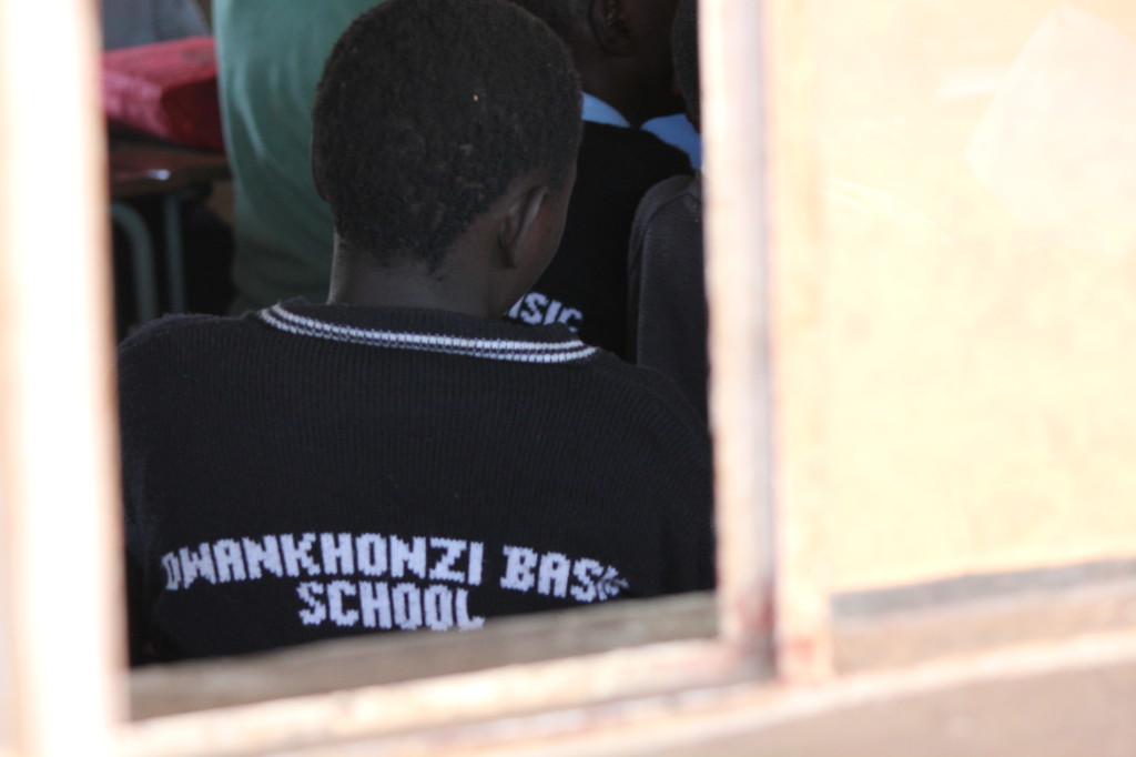 A student wears a locally made Dwankhozi sweater in class today.